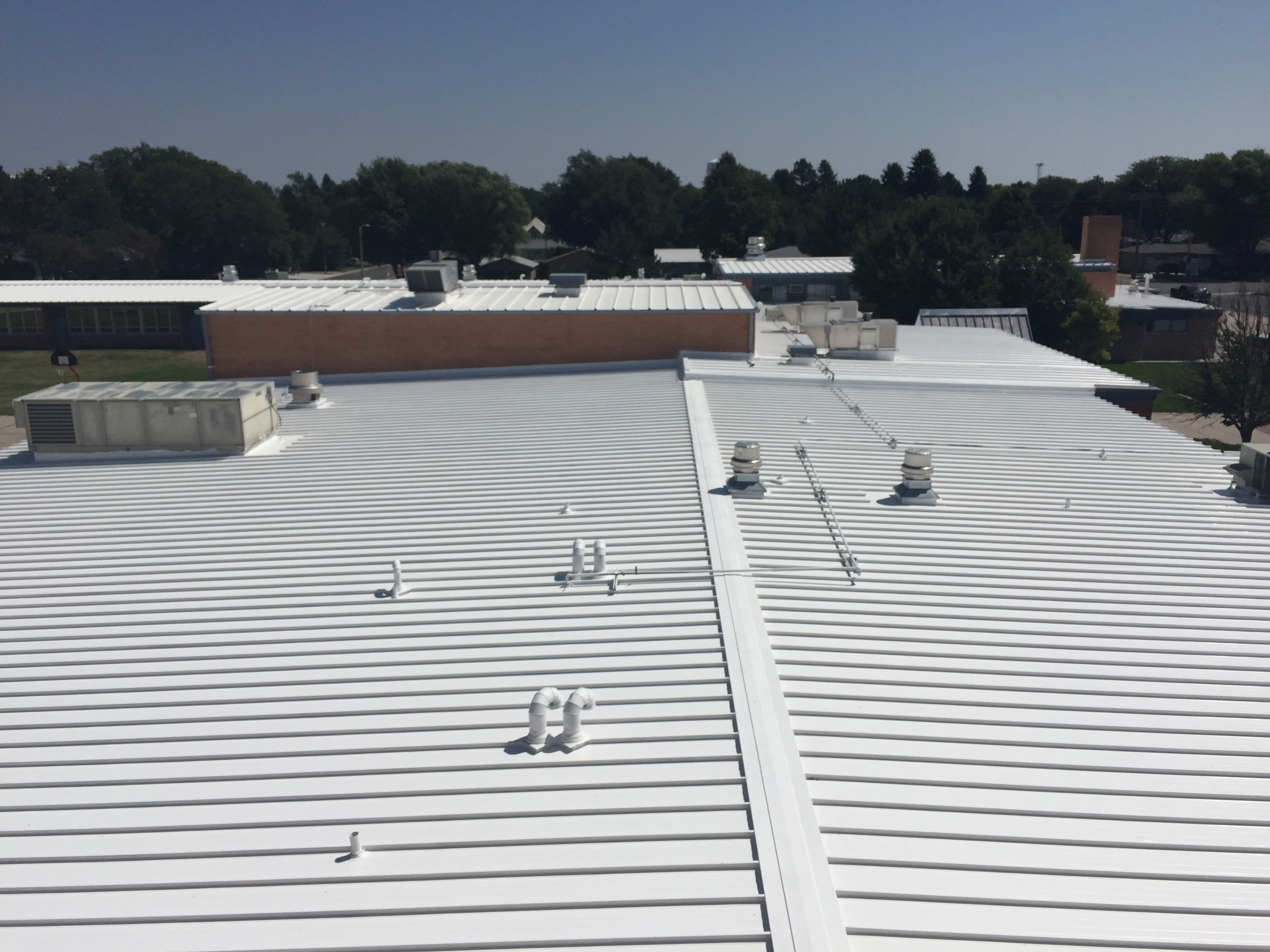 Roof coating restoration silicone acrylic commercial Missouri